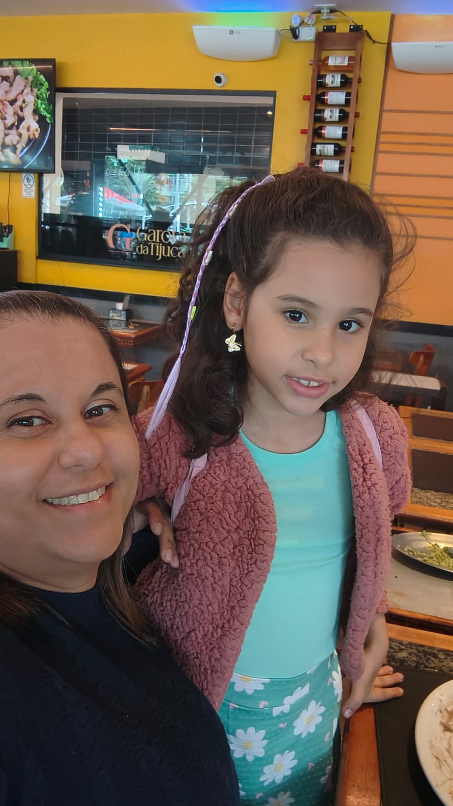 Andréa e Giovanna, esposa e filha de Marcio